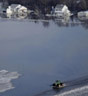 Har flommen nådd høydepunktet? Foto: AP.